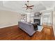 Living room with hardwood floors, fireplace, and decorative ceiling fan at 121 Fulton Se Way, Atlanta, GA 30312