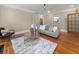 Comfortable living room with a gray sofa, area rug, and a decorative coffee table at 121 Fulton Se Way, Atlanta, GA 30312