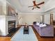 Bright, comfortable living room with fireplace, hardwood floors, and neutral decor at 121 Fulton Se Way, Atlanta, GA 30312