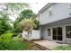 Backyard with patio and small garden bed at 1215 Harris Commons Pl, Roswell, GA 30076