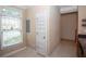 Bright kitchen area featuring tile floors, modern shelving, and plenty of natural light at 1215 Harris Commons Pl, Roswell, GA 30076