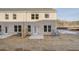 New construction backyard with a concrete patio and landscaping at 349 Heavenly Hollow Pl, Mcdonough, GA 30253