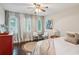 Bright bedroom featuring dark hardwood floors, neutral walls, and ample natural light at 443 Lakeshore Ne Dr, Atlanta, GA 30307