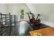 Bright exercise room featuring two stationary bikes and access to an outdoor deck at 443 Lakeshore Ne Dr, Atlanta, GA 30307