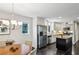 Well-lit kitchen featuring modern stainless steel appliances, granite countertops, and an island with bar seating at 443 Lakeshore Ne Dr, Atlanta, GA 30307