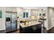Modern kitchen featuring granite countertops, stainless steel appliances, and center island at 443 Lakeshore Ne Dr, Atlanta, GA 30307