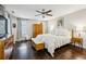 Serene main bedroom featuring dark hardwood floors, neutral walls, and plenty of natural light at 443 Lakeshore Ne Dr, Atlanta, GA 30307