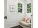 Bright sitting area with a comfortable chair and natural light from nearby windows at 443 Lakeshore Ne Dr, Atlanta, GA 30307