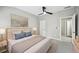 Cozy bedroom with carpet, ceiling fan and view of ensuite bathroom at 503 Mill Ridge Rd, Woodstock, GA 30188