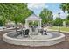 Outdoor fire pit area with comfortable seating, perfect for gatherings and relaxation at 503 Mill Ridge Rd, Woodstock, GA 30188