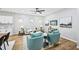 Cozy living space featuring modern decor, hardwood floors, and lots of natural light at 503 Mill Ridge Rd, Woodstock, GA 30188