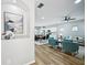 Open-concept living space with modern furnishings and lots of natural light at 503 Mill Ridge Rd, Woodstock, GA 30188