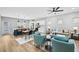 Bright, open floor plan featuring hardwood floors, modern furnishings, and recessed lighting at 503 Mill Ridge Rd, Woodstock, GA 30188