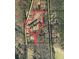 Aerial view of a large parcel of land with approximately 13 acres at 7000 Petersburg Rd, Fairburn, GA 30213