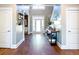Welcoming foyer with hardwood floors, stylish decor, and a view of the staircase at 109 Lighthorse Blvd, Mcdonough, GA 30252