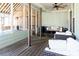 Relaxing screened-in porch with comfortable seating and serene outdoor views at 109 Lighthorse Blvd, Mcdonough, GA 30252