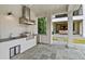 Outdoor kitchen featuring stainless steel grill, sink, and modern appliances at 258 Pineland Nw Rd, Atlanta, GA 30342