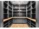 Spacious walk-in pantry with ample shelving, custom cabinets, and wood countertops at 258 Pineland Nw Rd, Atlanta, GA 30342