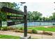 Chastain Tennis Center sign pointing to tennis courts at 258 Pineland Nw Rd, Atlanta, GA 30342