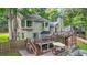 Expansive backyard with multi-level decks, a patio, and fenced yard at 2666 Peachtree Walk, Duluth, GA 30096