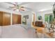 Serene bedroom with scenic views, hardwood floors, and a cozy window seat at 2666 Peachtree Walk, Duluth, GA 30096