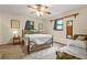 Cozy bedroom showcasing a metal bed frame, natural light, and a calming aesthetic at 2666 Peachtree Walk, Duluth, GA 30096