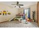 Bright bedroom with fun decor, a loft bed, and space for playing with toys at 2666 Peachtree Walk, Duluth, GA 30096