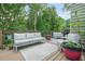 Comfortable deck space featuring modern outdoor furniture and a lush, green backdrop at 2666 Peachtree Walk, Duluth, GA 30096
