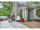 Relaxing deck with outdoor grill, comfortable seating, and lovely green view at 2666 Peachtree Walk, Duluth, GA 30096