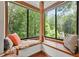 Charming window nook with seating, offering peaceful views of the surrounding greenery at 2666 Peachtree Walk, Duluth, GA 30096