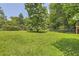 Large, expansive grassy backyard at 62 Sweetwater Pkwy, Powder Springs, GA 30127