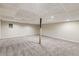 Open basement area with finished ceilings and floors at 62 Sweetwater Pkwy, Powder Springs, GA 30127