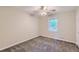 Small bedroom with carpet, neutral colors and a ceiling fan providing a comfortable retreat at 62 Sweetwater Pkwy, Powder Springs, GA 30127