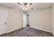Comfortable bedroom with neutral paint, closet, and ceiling fan offering a relaxing space at 62 Sweetwater Pkwy, Powder Springs, GA 30127