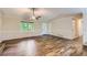 Beautiful living room with hardwood floors, neutral walls, and ample natural light, perfect for entertaining at 62 Sweetwater Pkwy, Powder Springs, GA 30127