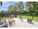 Private backyard featuring a patio area, grill, and large grassy area at 6329 Granbury Walk, Acworth, GA 30101
