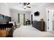 Spacious bedroom with a crib, dresser, and ensuite bathroom at 6329 Granbury Walk, Acworth, GA 30101