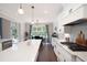 Gourmet kitchen with a large island, white cabinets, and stainless steel appliances at 6329 Granbury Walk, Acworth, GA 30101