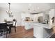 Bright kitchen featuring white cabinets, stainless steel appliances, and a breakfast nook at 6329 Granbury Walk, Acworth, GA 30101