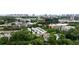 Aerial view of a community surrounded by mature trees and the downtown skyline at 821 Ralph Mcgill Ne Blvd # 2219, Atlanta, GA 30306
