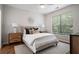 Comfortable bedroom with large window, stylish furnishings, and patterned rug at 821 Ralph Mcgill Ne Blvd # 2219, Atlanta, GA 30306