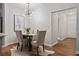 Cozy dining area with table and chairs, modern lighting, and view into hallway at 821 Ralph Mcgill Ne Blvd # 2219, Atlanta, GA 30306
