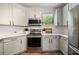 Modern kitchen featuring stainless steel appliances, light countertops, and white subway tile backsplash at 821 Ralph Mcgill Ne Blvd # 2219, Atlanta, GA 30306
