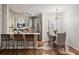 Bright kitchen and dining area with stainless steel appliances, bar seating and modern lighting at 821 Ralph Mcgill Ne Blvd # 2219, Atlanta, GA 30306