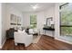 Bright living room with modern furniture, large windows, and stylish decor at 821 Ralph Mcgill Ne Blvd # 2219, Atlanta, GA 30306