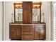 Bathroom with vanity and built in mirrors at 1385 Northcliff Trce, Roswell, GA 30076