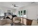 Bright main bedroom with a seating area and views of the pool at 1385 Northcliff Trce, Roswell, GA 30076