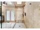 Beautiful shower with tile, shower head and seat at 1385 Northcliff Trce, Roswell, GA 30076