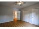 Spacious bedroom featuring hardwood floors, ceiling fan and closets at 1800 Clairmont Lk # A226, Decatur, GA 30033