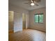 Bright bedroom with hardwood floors, a ceiling fan and closets at 1800 Clairmont Lk # A226, Decatur, GA 30033